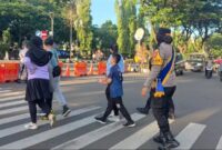1761500413911-personel-mojang-lodaya-polwan-polres-bogor-melaksanakan-patroli-di-car-free-day-dokistimewa-1761492937086_169
