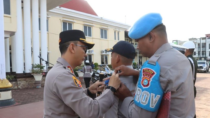 1763380133960-apel-pasukan-operasi-zebra-lancang-kuning-2025-di-polres-dumai-1763374558357_169