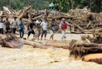 1764414363842-akses-jalan-di-tapanuli-selatan-putus-akibat-banjir-bandang-1764409766764_169