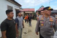 1764760037988-wakapolri-tiba-di-aceh-tamiang-cek-kebutuhan-para-pengungsi-1764759067880_169