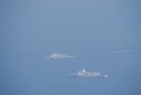 1764932832497-kapal-kapal-penjaga-pantai-china-berlayar-di-perairan-sekitar-taiwan-selama-latihan-perang-digelar_169