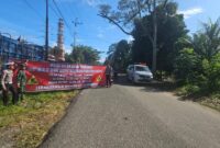 1765083947231-polisi-merekayasa-lalu-lintas-menuju-lokasi-terdampak-bencana-galodo-di-kecamatan-palembayan-kabupaten-agam-sumatera-barat-1765079346366_169