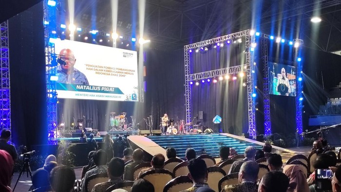 1765386359124-menteri-ham-natalius-pigai-saat-berpidato-dalam-peringatan-hari-ham-sedunia-di-jakarta-matiusdetikcom-1765382134732_169