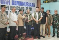 1765688740070-ketua-mpr-ri-ahmad-muzani-menyalurkan-bantuan-kepada-korban-bencana-di-sumatera-utara-1765686266607_169