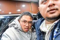 1765861619571-youtuber-muhammad-adimas-diperiksa-polda-jabar-usai-ditangkap-di-semarang-1765854541939_169