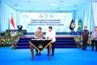 1765904781702-kapolri-jenderal-listyo-sigit-prabowo-saat-penandatanganan-nota-kesepahaman-mou-tentang-penerapan-kuhp-kuhap-baru-bersama-jaks-1765896506049_169