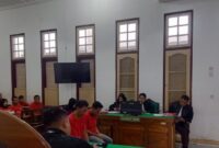 1765926292250-bapak-anak-pelaku-pembunuhan-sopir-di-medan-menjalani-sidang-putusan-di-pengadilan-negeripn-medan-selasa16122025-juitadetiksum-1765898801183_169