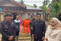 1766034413882-bantuan-polri-di-wilayah-terdampak-bencana-sumatera-1766031717263_169